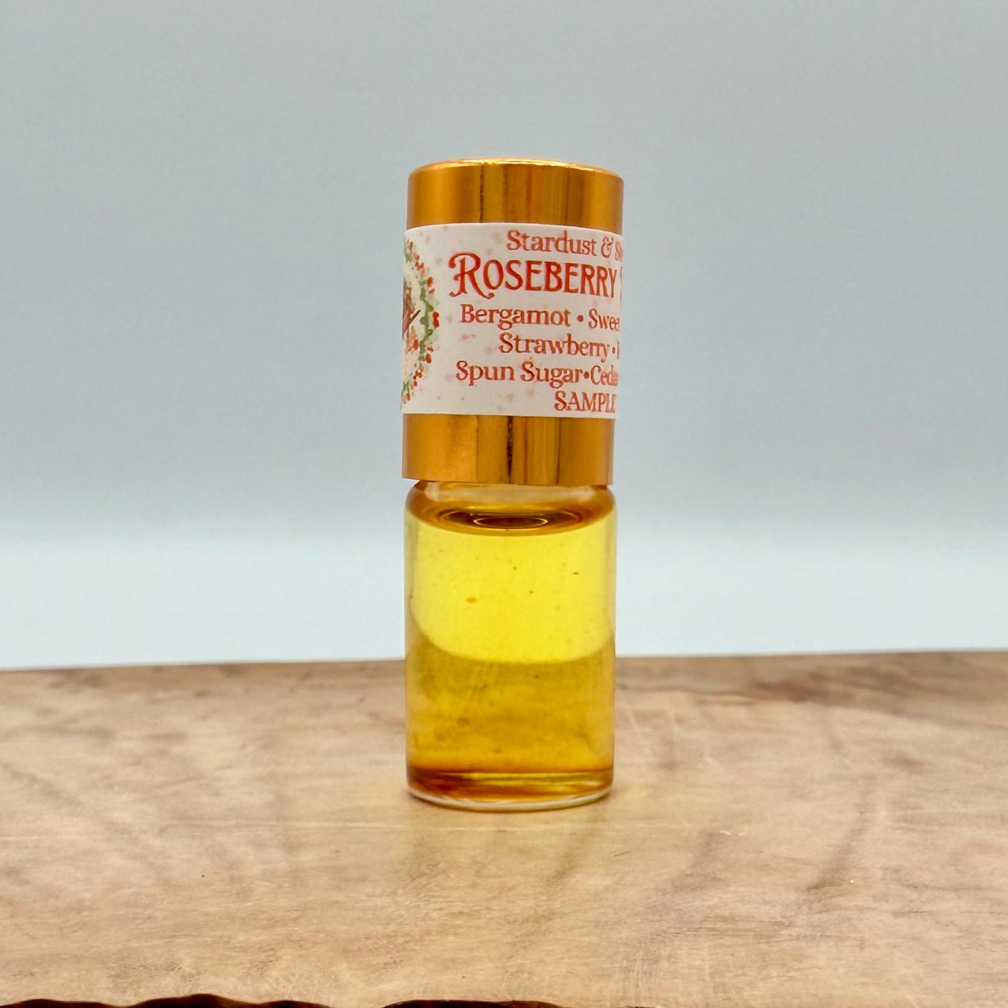 ROSEBERRY BRIAR- Calabrian Bergamot Peel, Sweet Orange, Wild Strawberry, Antique Rose Blossoms, Spun Sugar, Smoked Cedar Wood, Madagascar Vanilla Bean