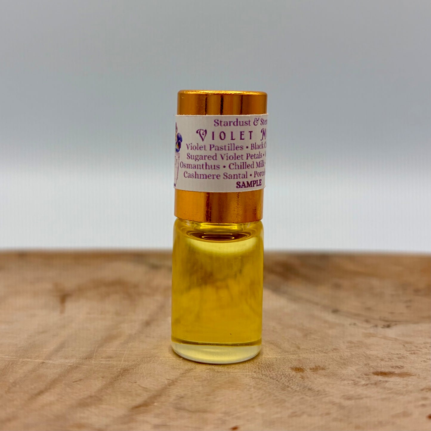 VIOLET MILK - Violet Pastilles, Sugared Violet Petals, Hint of Black Cherry, Violet Leaf, Osmanthus, Chilled Milk, Tonka Bean, Cashmere Santal, Porcelain Teacup