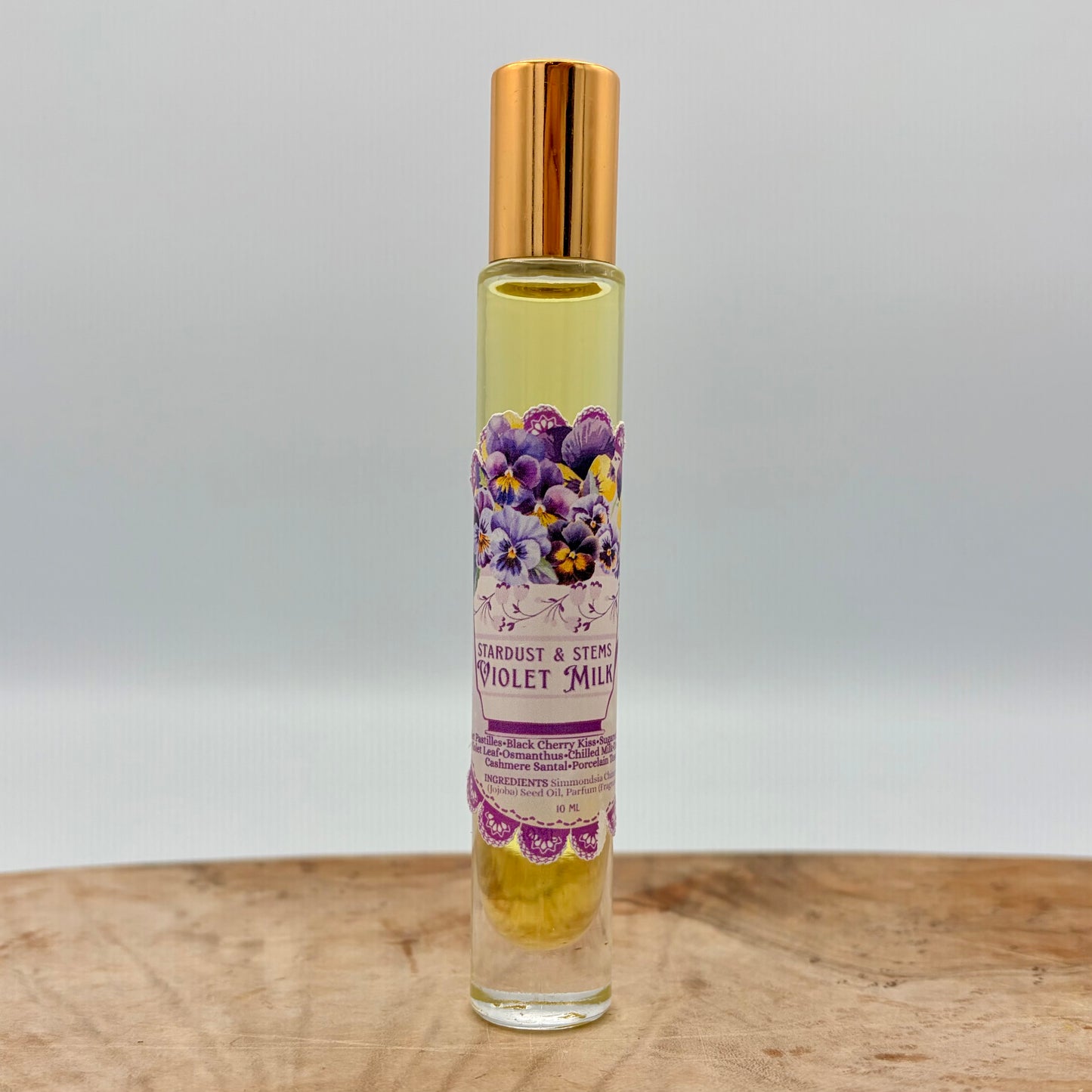 VIOLET MILK - Violet Pastilles, Sugared Violet Petals, Hint of Black Cherry, Violet Leaf, Osmanthus, Chilled Milk, Tonka Bean, Cashmere Santal, Porcelain Teacup
