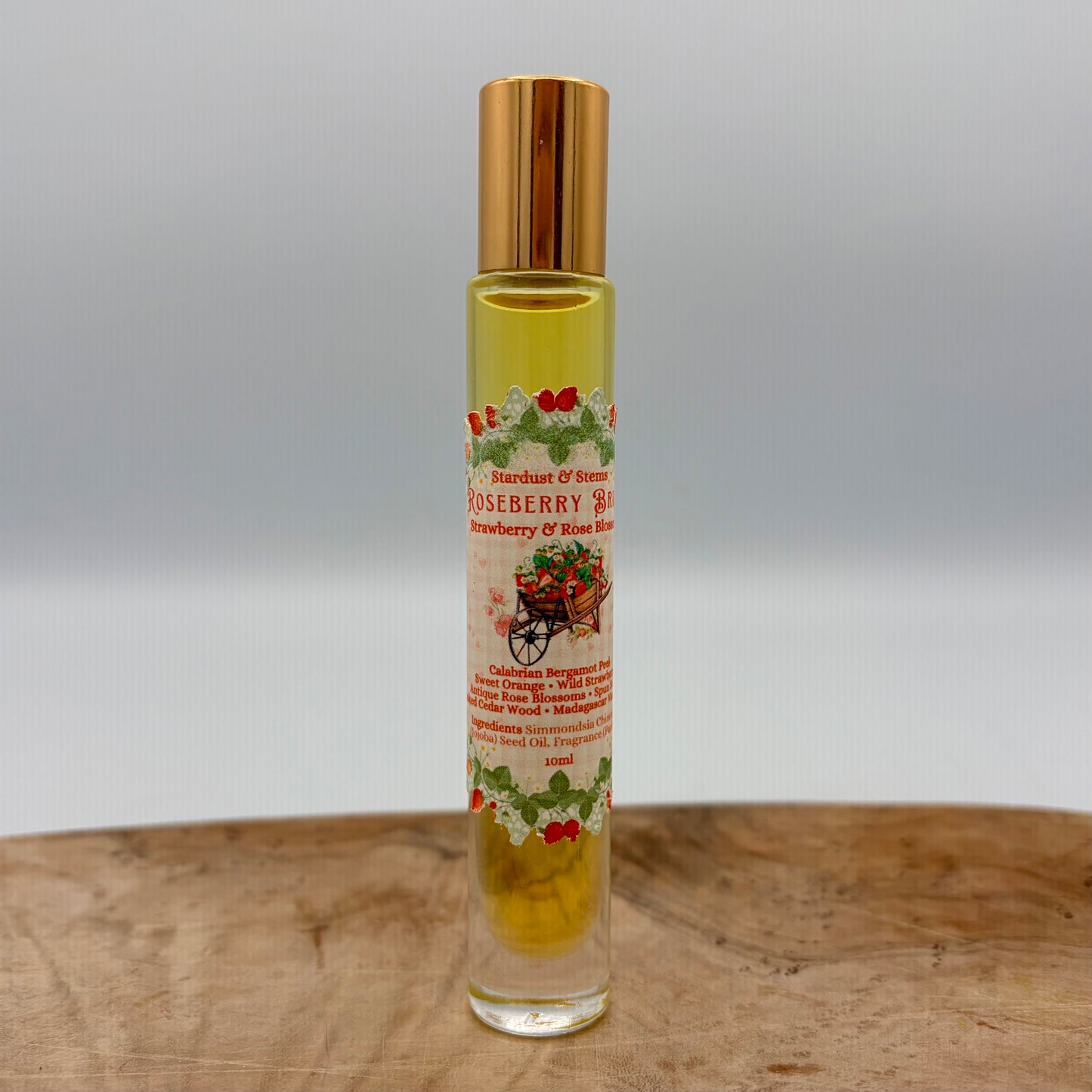 ROSEBERRY BRIAR- Calabrian Bergamot Peel, Sweet Orange, Wild Strawberry, Antique Rose Blossoms, Spun Sugar, Smoked Cedar Wood, Madagascar Vanilla Bean