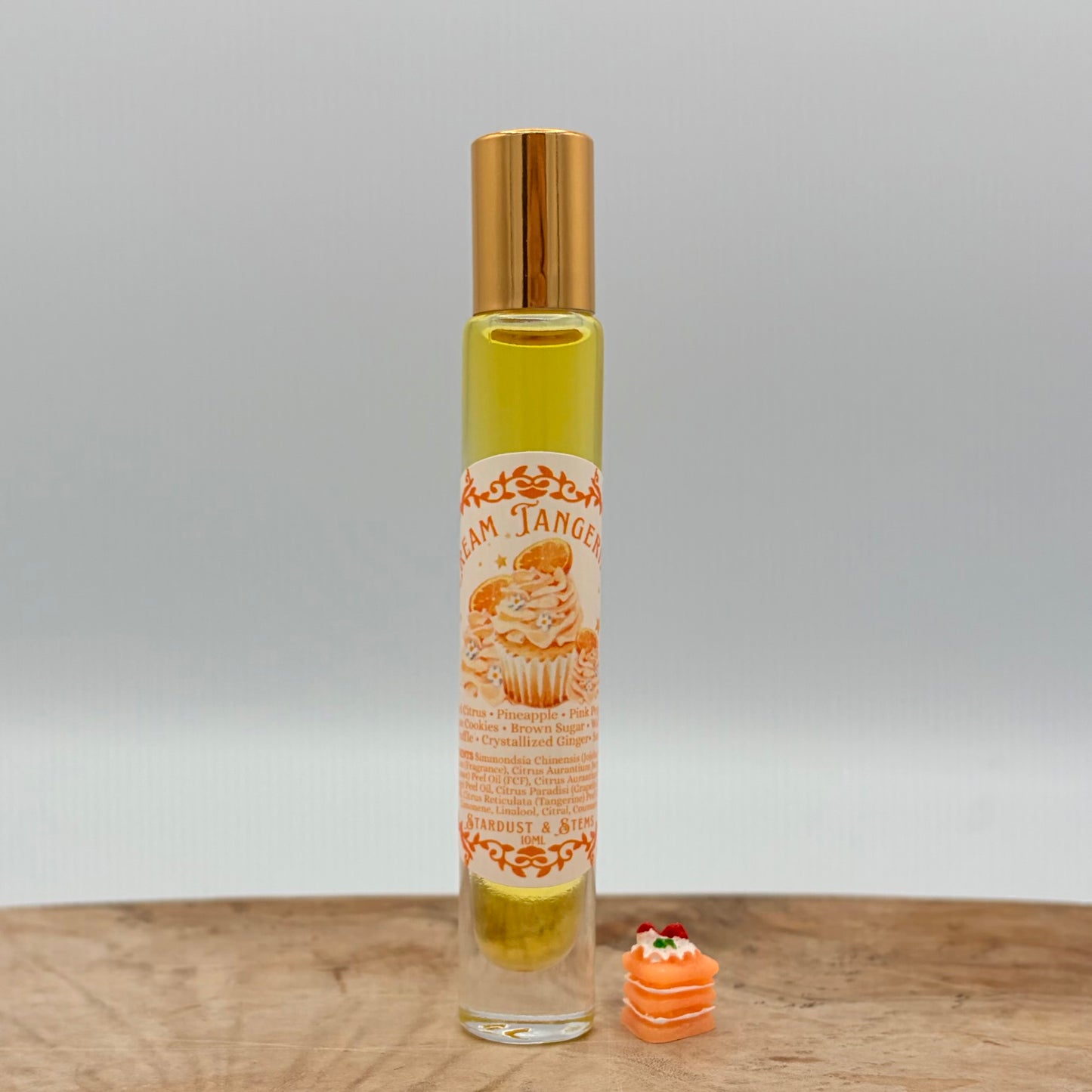 CREAM TANGERINE- Candied Citrus, Pink Peppercorn, Meringue Cookies, Brown Sugar, Vanilla Waffle Cone, Savoy Truffle, Crystallized Ginger, Sandalwood