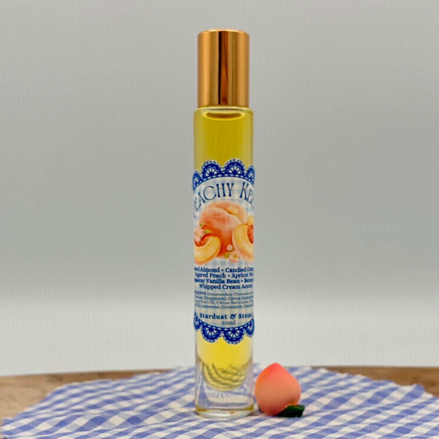 PEACHY KEEN- Sugared Peach, Toasted Almond, Candied Orange Peel, Apricot Nectar, Madagascar Vanilla Bean, Benzoin Resin, Whipped Cream Accord