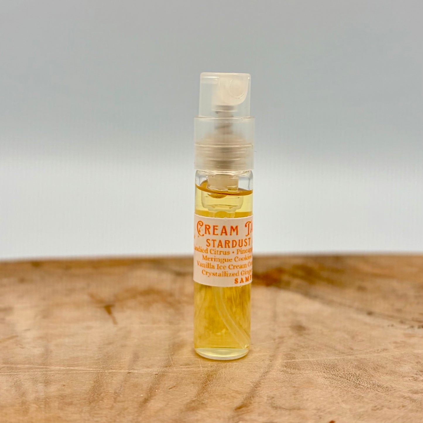 CREAM TANGERINE- Candied Citrus, Pink Peppercorn, Meringue Cookies, Brown Sugar, Vanilla Waffle Cone, Savoy Truffle, Crystallized Ginger, Sandalwood