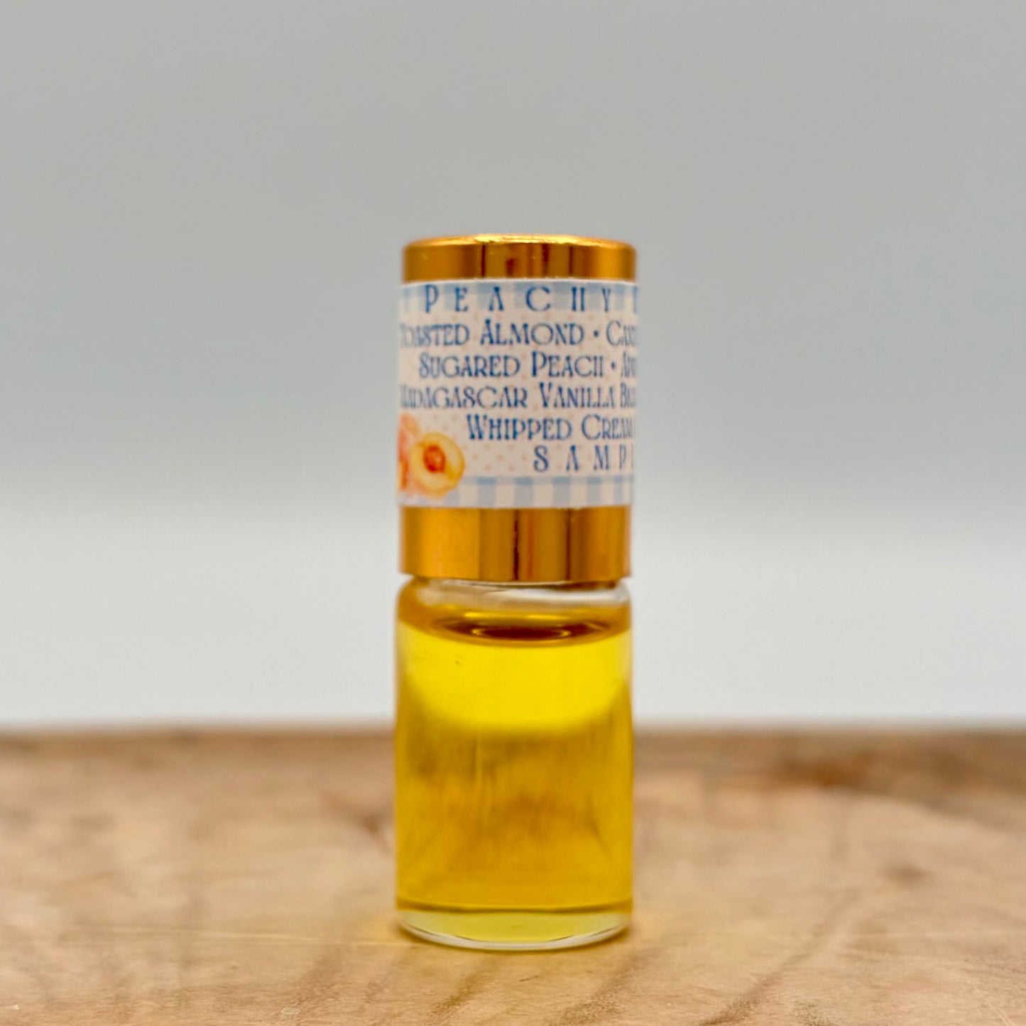 PEACHY KEEN- Sugared Peach, Toasted Almond, Candied Orange Peel, Apricot Nectar, Madagascar Vanilla Bean, Benzoin Resin, Whipped Cream Accord